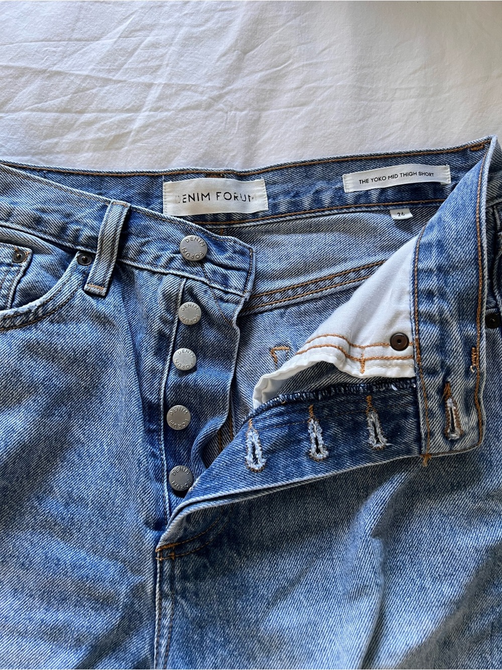 High-Waist Light Blue Denim Shorts with Frayed Hem
